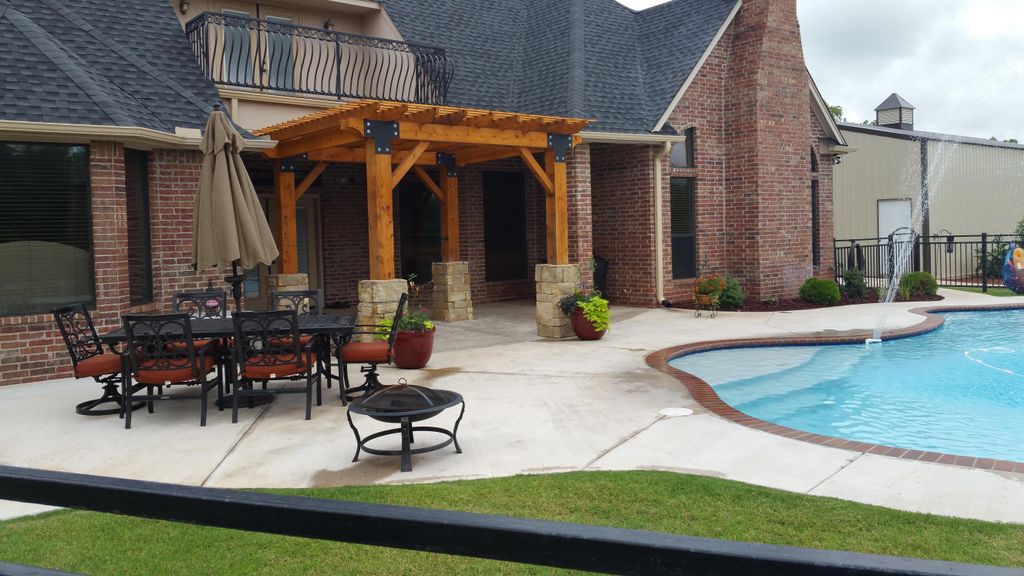 Concrete and pergola by M&V General Construction