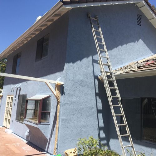 Another exterior. Spraying stucco! San Diego paint