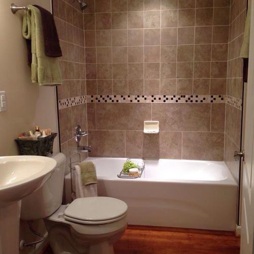 Custom tile backsplashes on an existing bathtub ar