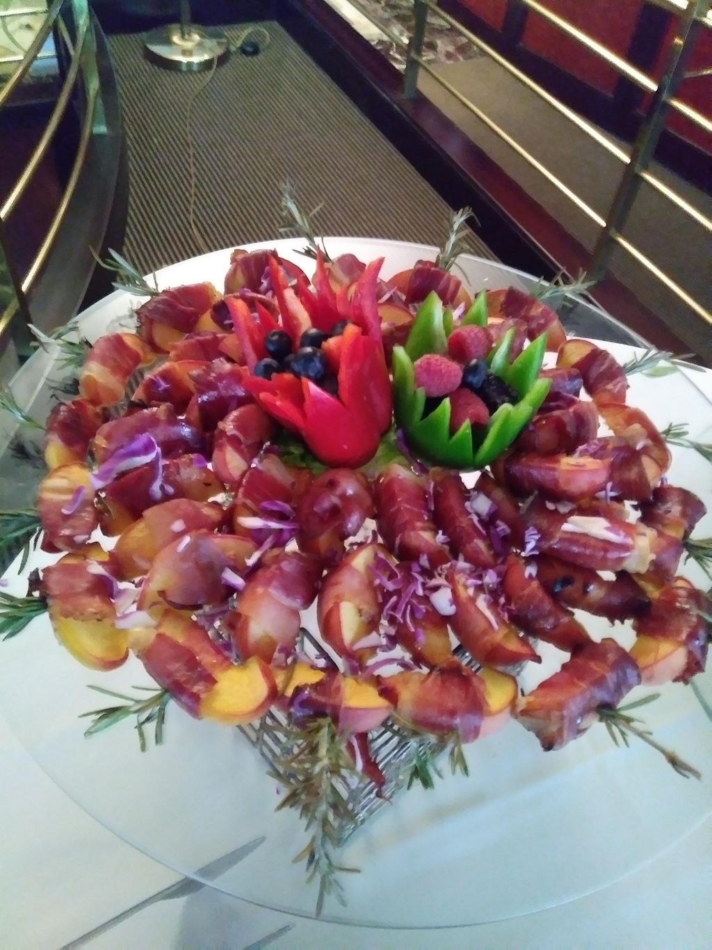 Prosciutto wrapped peaches with rosemary
