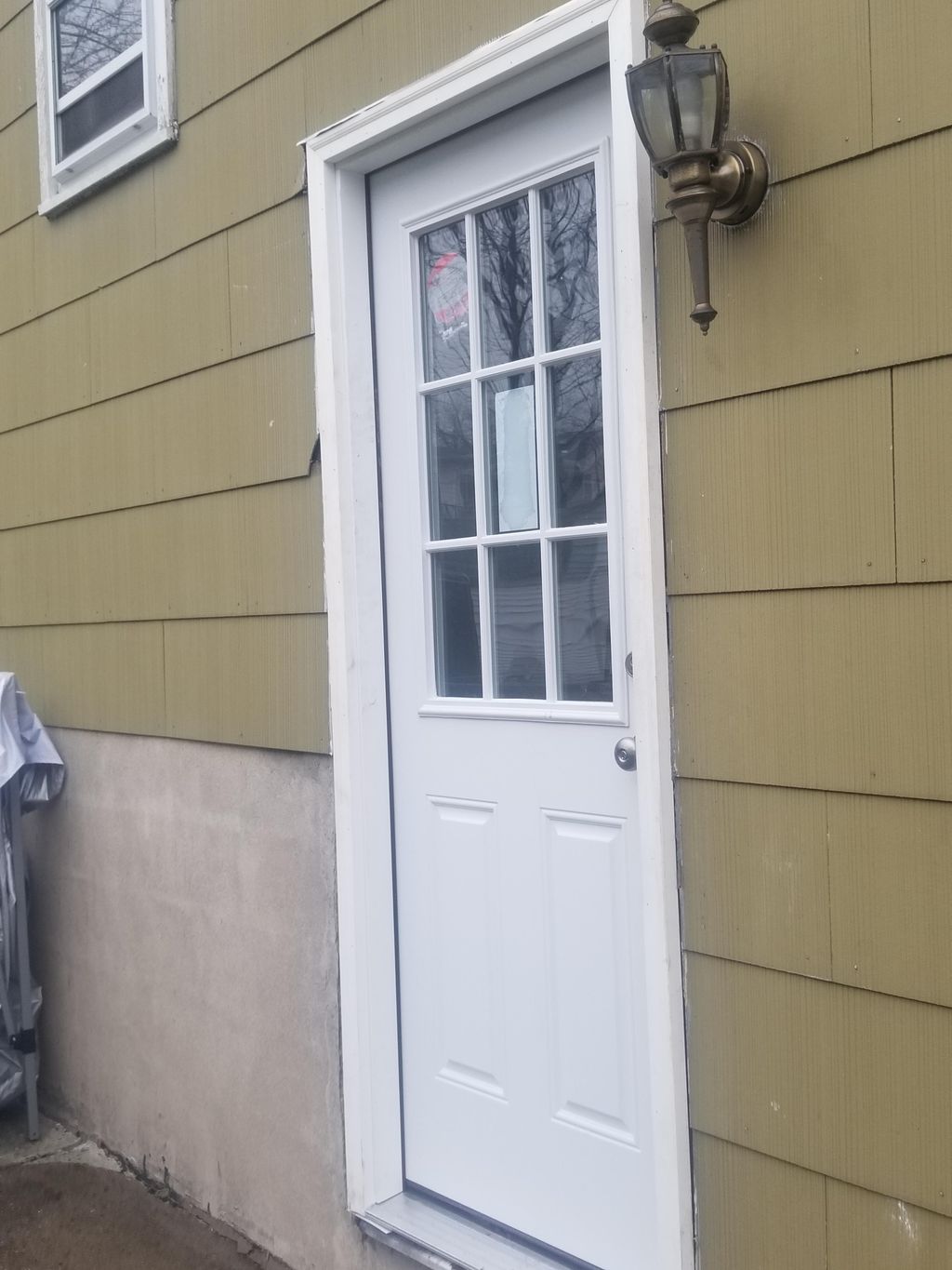 Exterior door installation 'after' with hardware 
