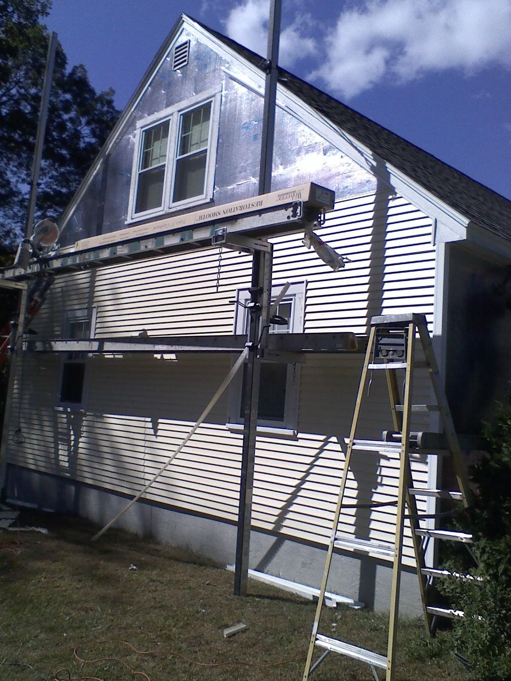 Vinyl Siding - Always best to strip existing sidin