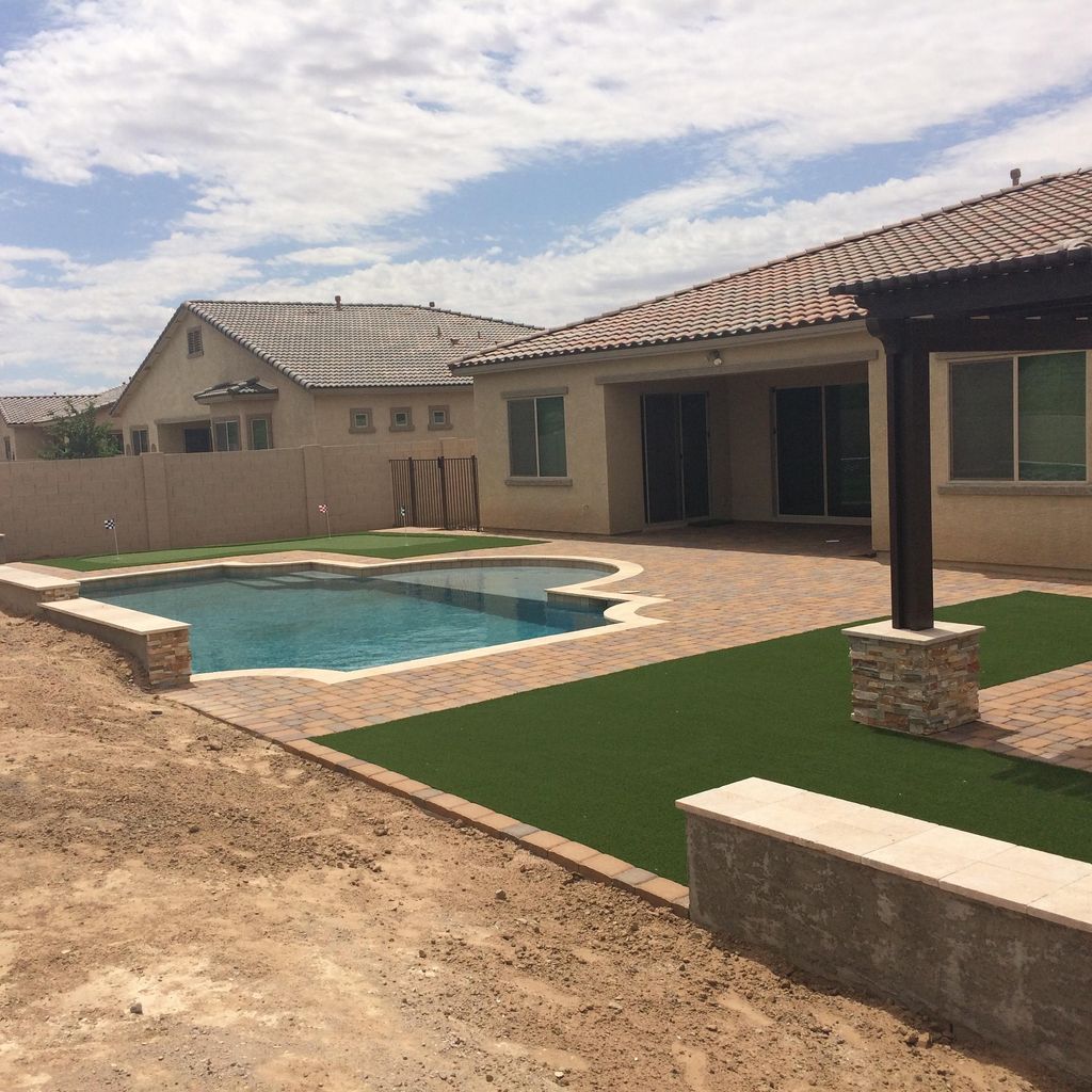 Full Hardscape install. Pergola, Turf, benches, pa