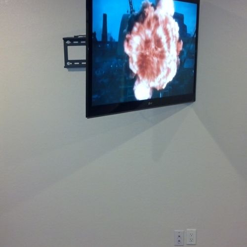 55" LG on a swivel mount. With the components in t
