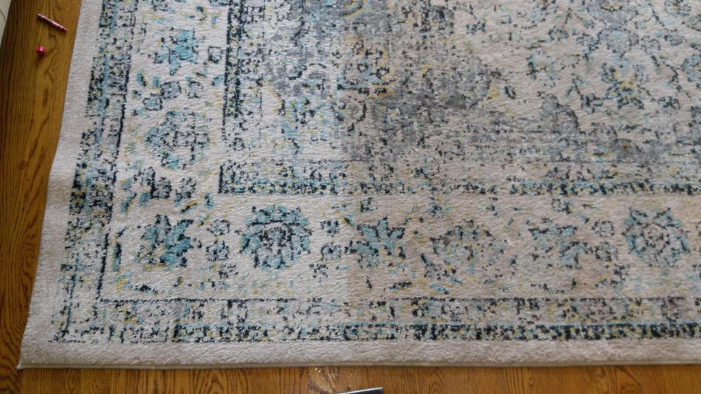 Area Rug Cleaning - Before on the right - in progr