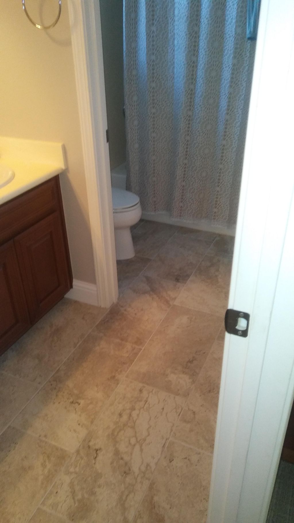 Hall bath 12"×24" tile and 5 1/4" base board