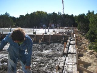 Placing concrete on Custom Home foundation Leander