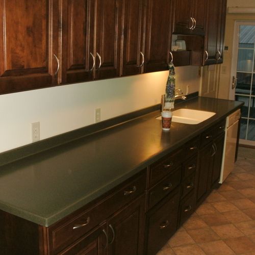 Corian Moss with molded sink and coved backsplash.