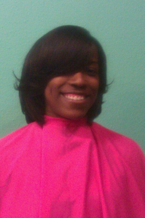 Relaxed hair w/ feathered look