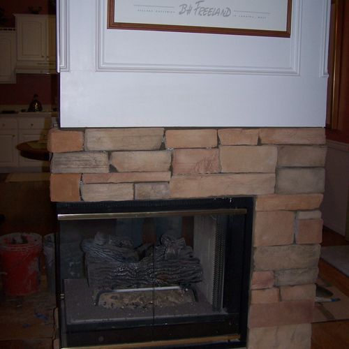 Corner fireplace in residential house.