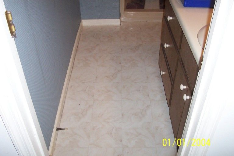 Sheet vinyl and shoe moulding installed by Pride-N