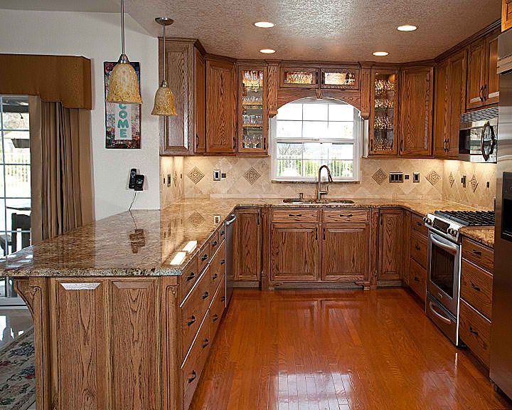 Complete kitchen remodel with custom built oak cab