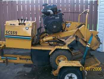Small tree stump grinder that can fit through a st