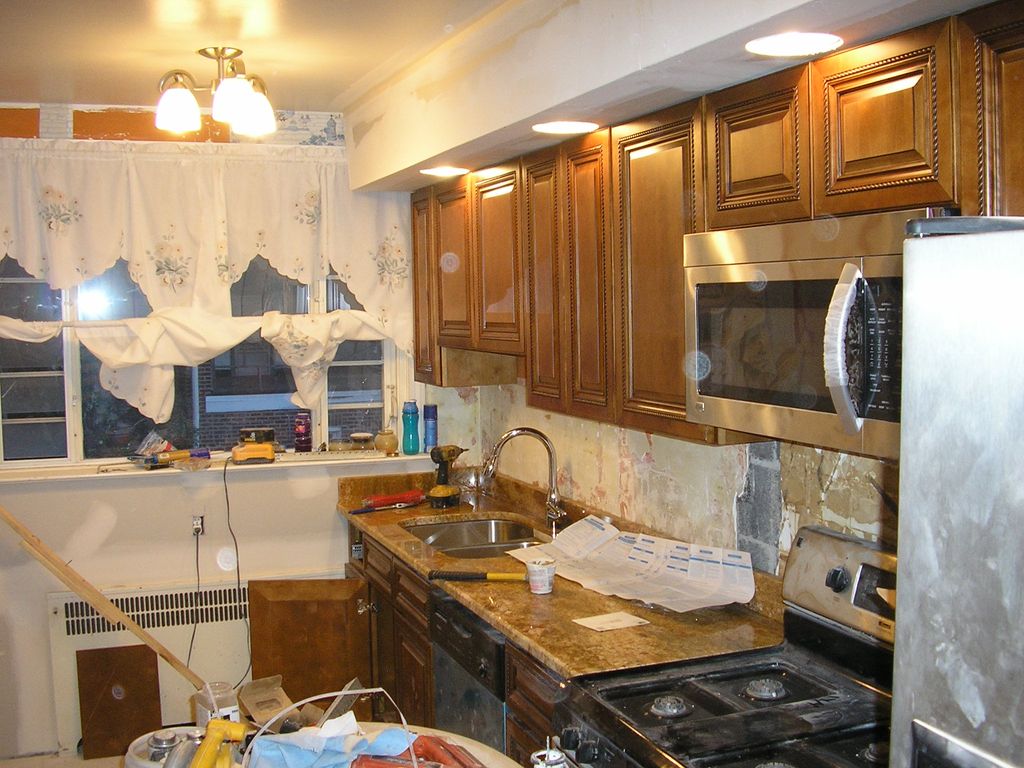 (AFTER) cherry cabinet install with granite counte