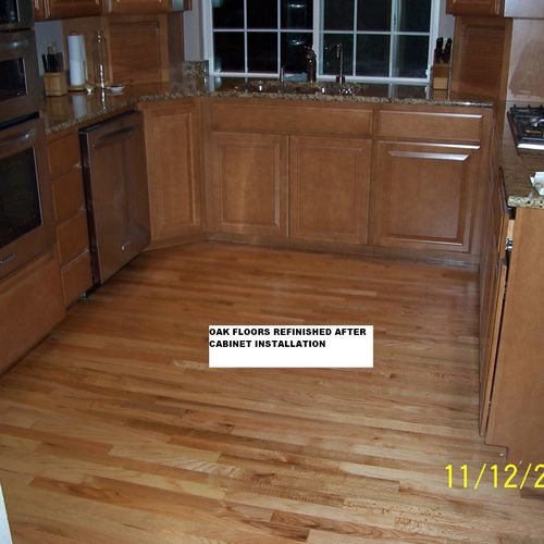 Refinished Oak flooring , new cabinets and Granite