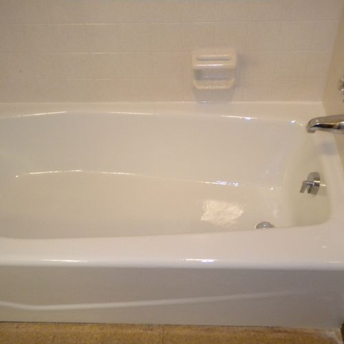 The blue tub was refinished in white quickly updat