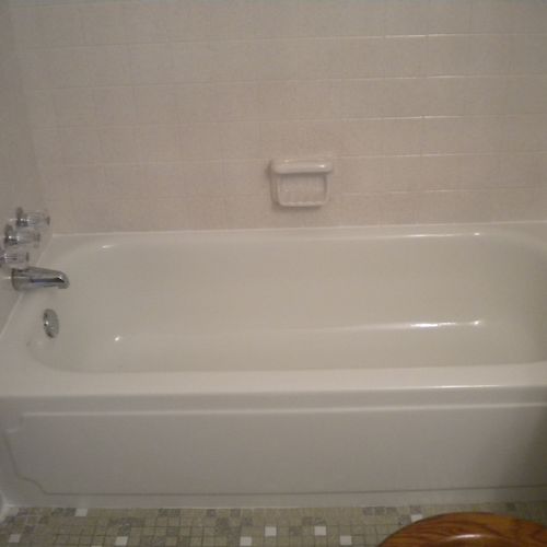 The tile was repaired and both the tub and tile we