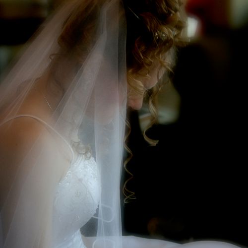 Here, I blurred the background to help the bride s