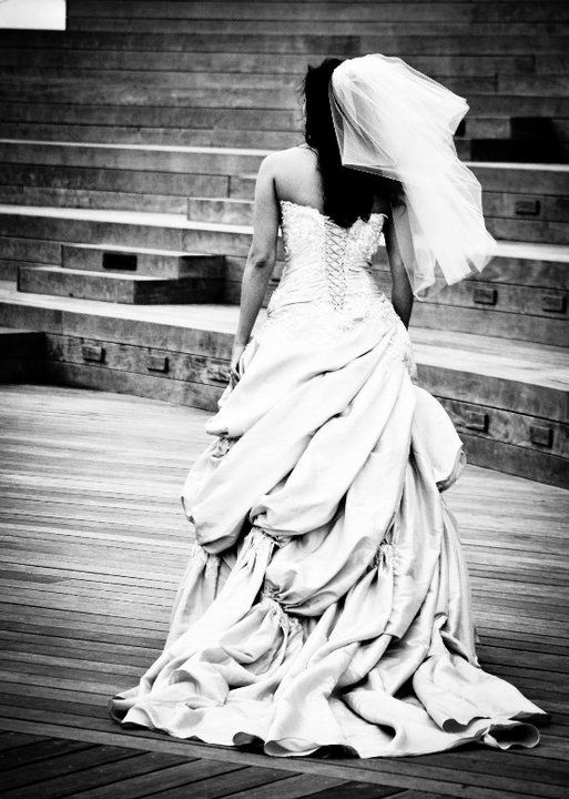 Beautiful wedding gown on the docks of Lake Michig