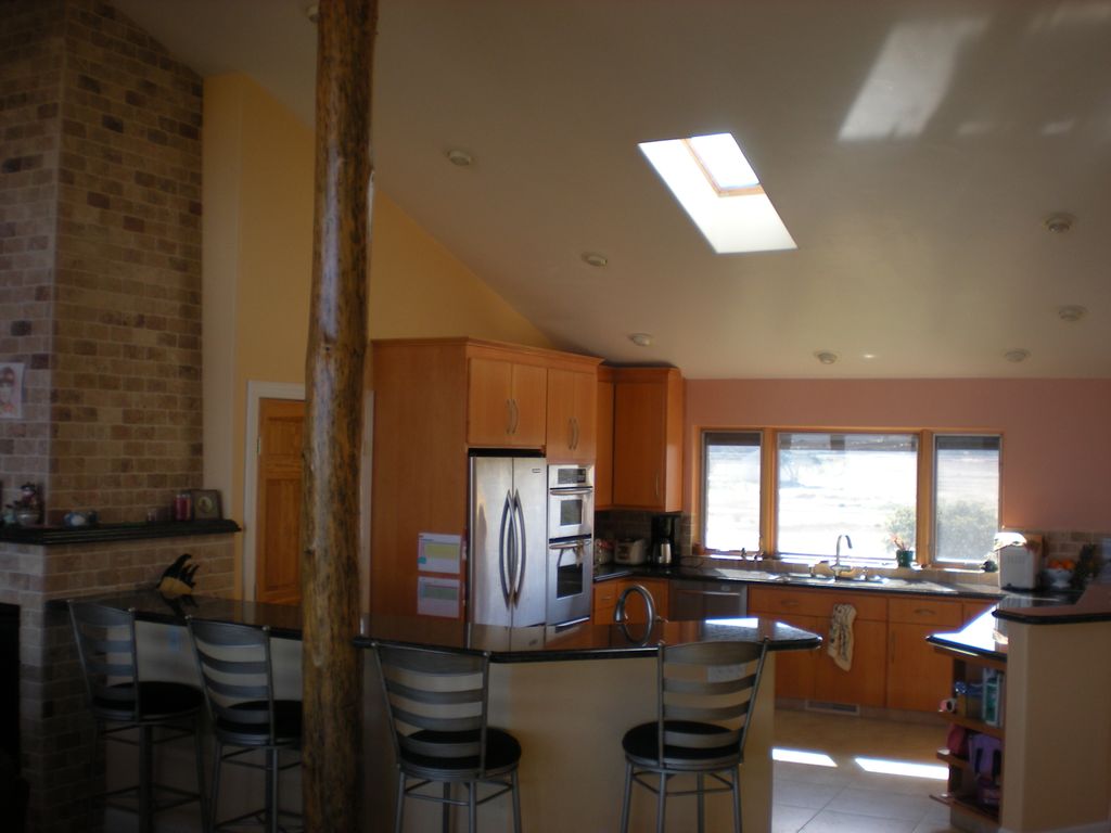Custom kitchen w/maple cabinets, granite and stain