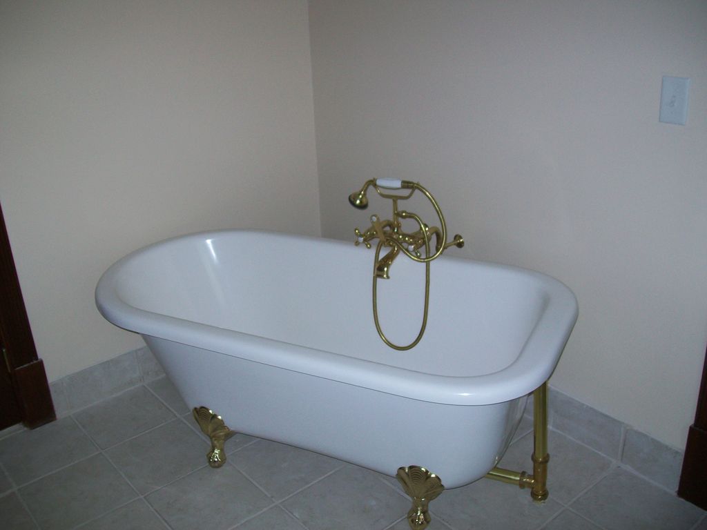 Traditional claw foot tub.
