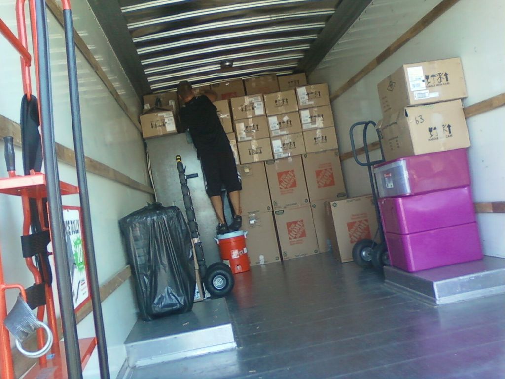 One of our Lead men loading up a 26' Truck