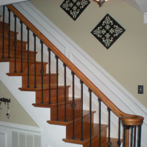 Installed Wainscoting, ballusters, and repaint.