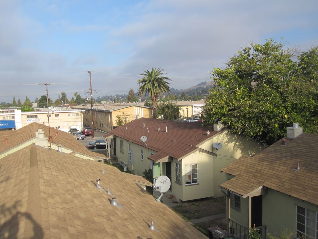 Painted 20 two family building in San Leandro, alt