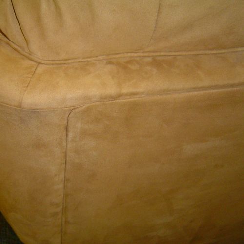 Completed upholstery repair in customer's home wit
