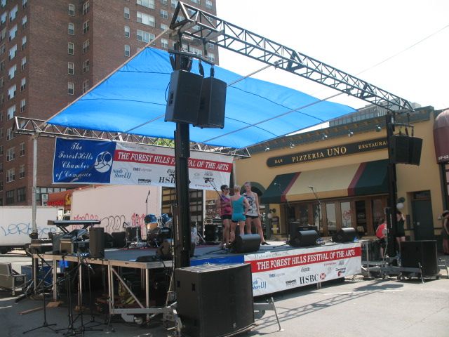 24'W x 16'D x 40"H stage with shade roof and sound