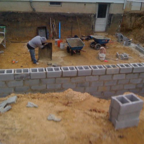 We poured the footings and started the blockwork.