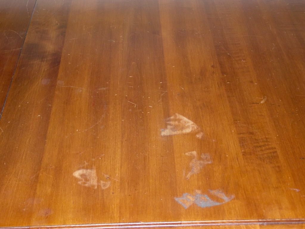 This table was damaged when a rag with some solven