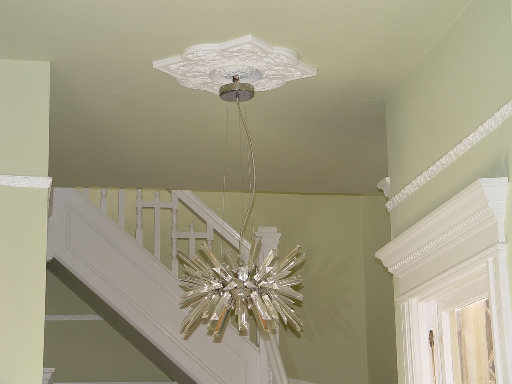 Chandelier wired and hung from gas tube fixture on