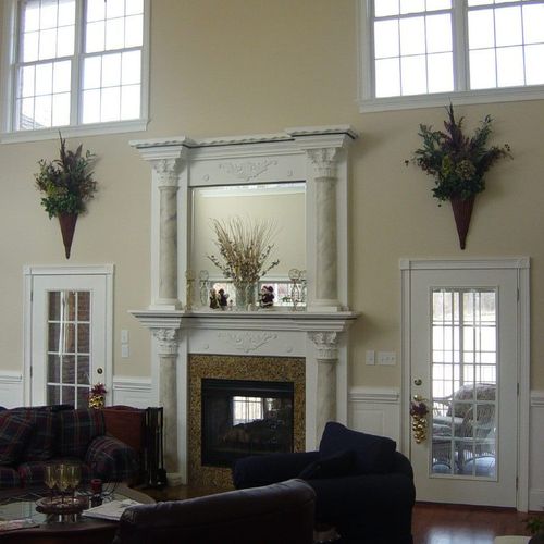 Double custom mantle with marbleized half columns 