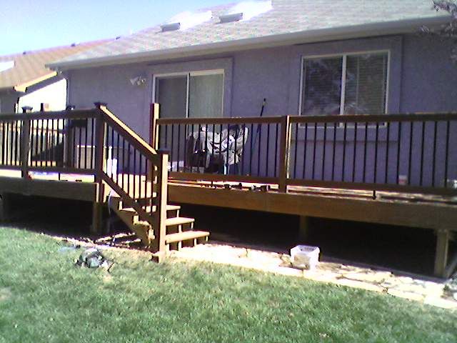 Deck leveled with new railing and lights installed