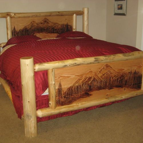 Custom log bed set with carved head/foot boards.