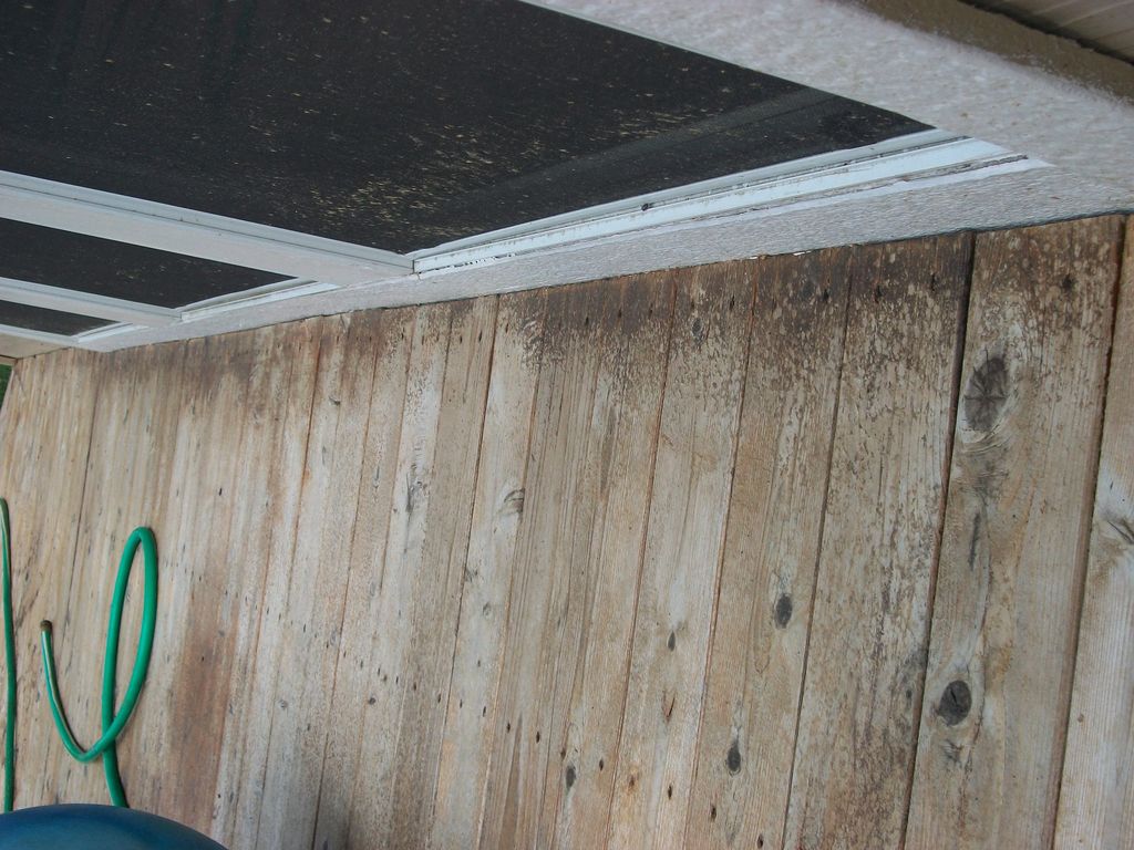 Stained wood deck ,not properly stained