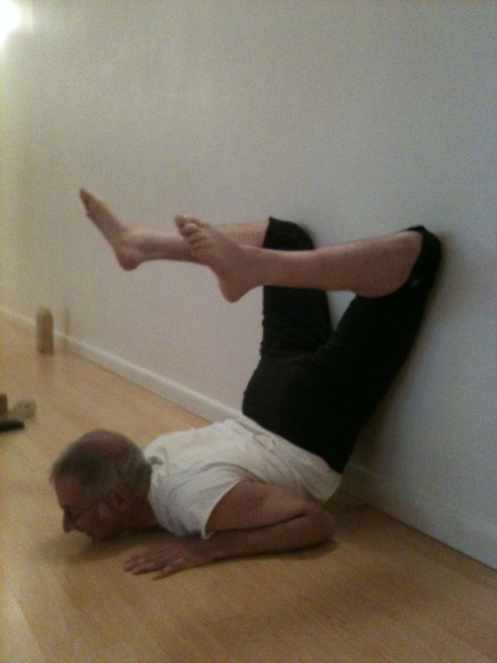 Elliot practicing Scorpion pose