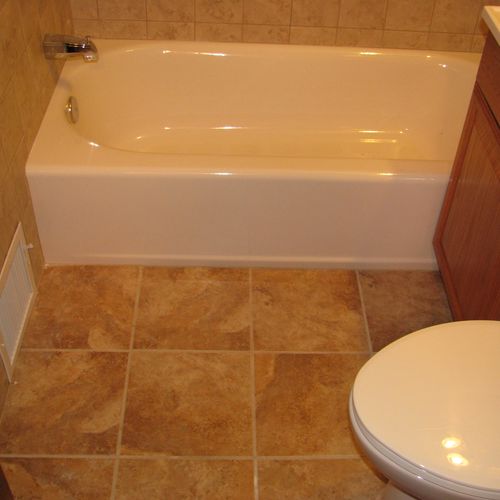 Donahue bath - new tub, tile floor