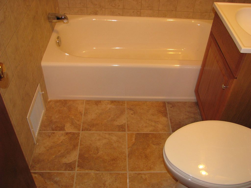 Donahue bath - new tub, tile floor