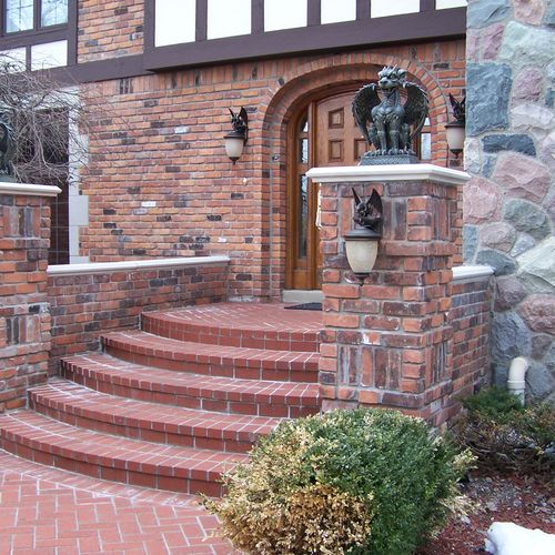 Residential paverbrick sidewalk, steps, and column