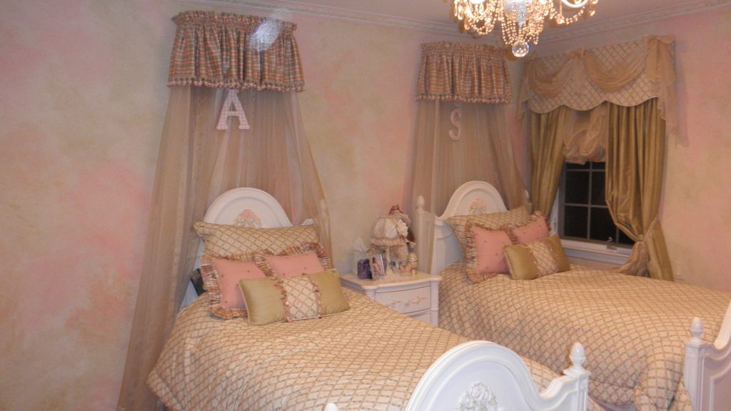 The walls, molding and embellishments on the furni