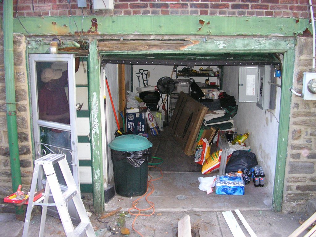 (BEFORE) Rear rot over top of garage door, on the 