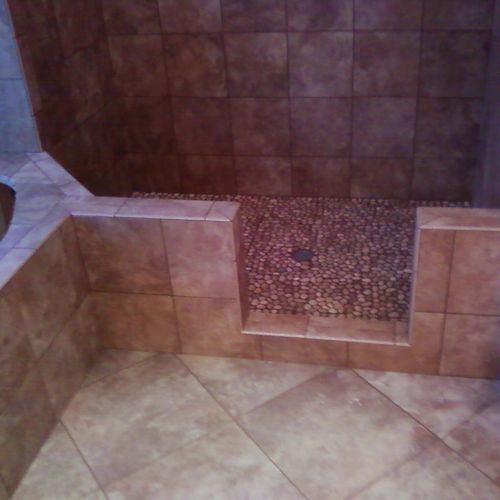 A shower I bulit from the floor up.. then tiled an