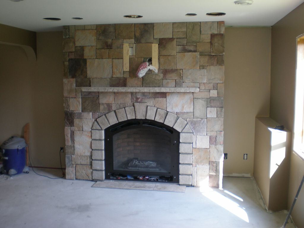 cultured stone: castle stone with trim stone arch