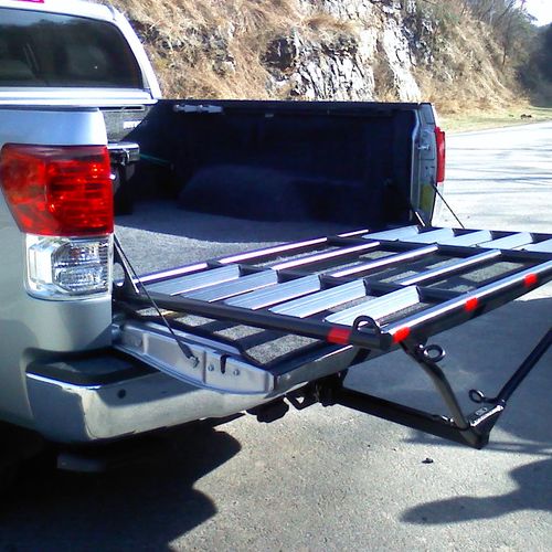 Bed extender to haul ATV's w/o a trailer