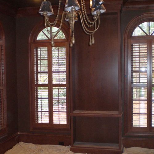 Stained wood plantation shutters