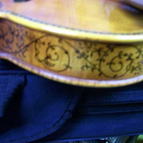 custom violin carving