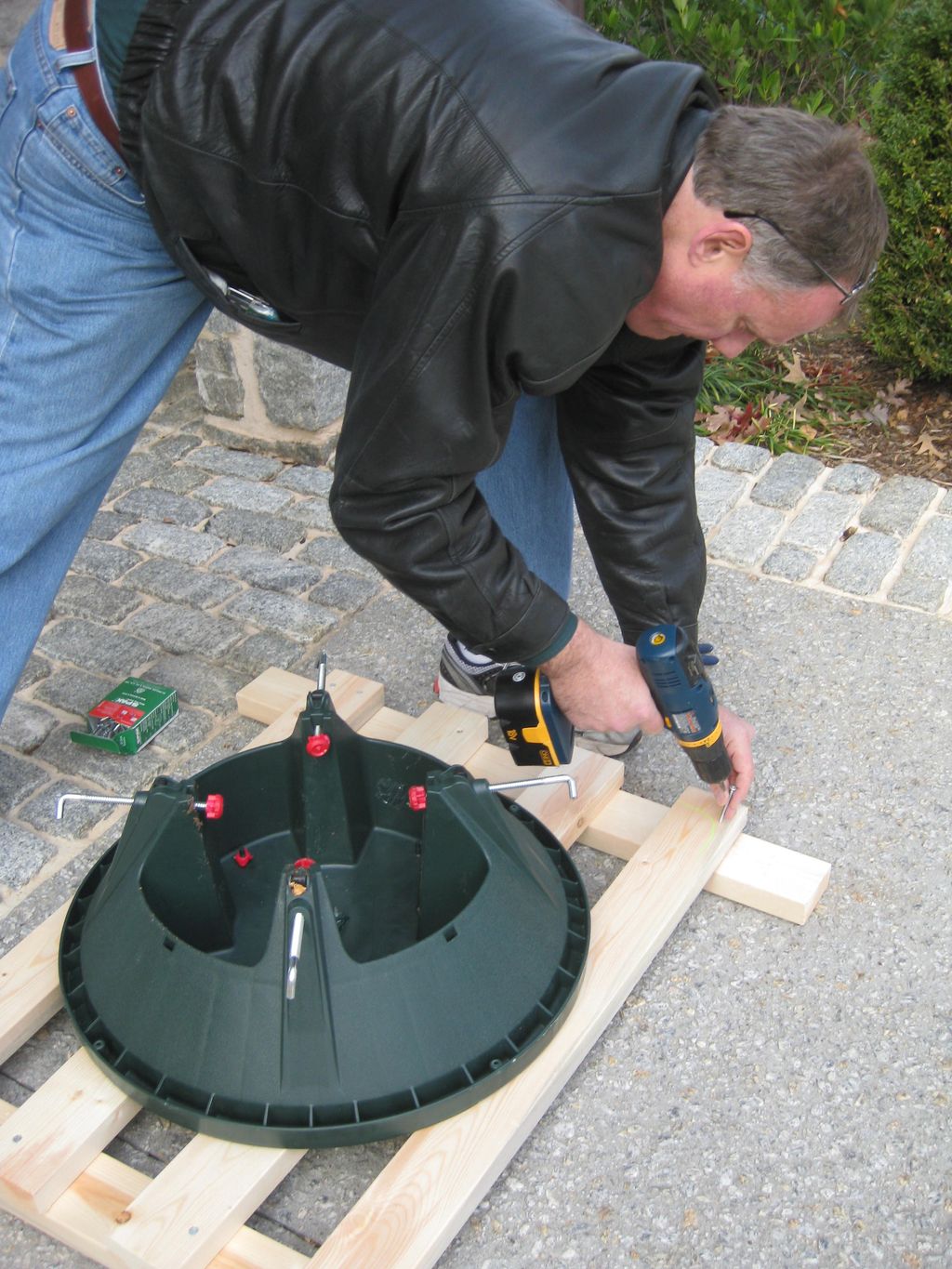 Frank, Owner of Spectrum, creating a tree stand fo