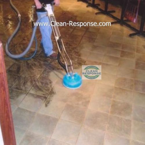 Clean a tile floor in a restaurant